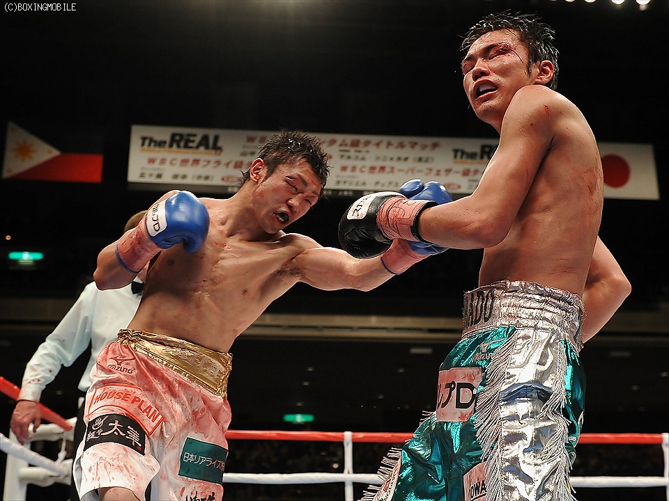 �u���ǂ���̐킢�v